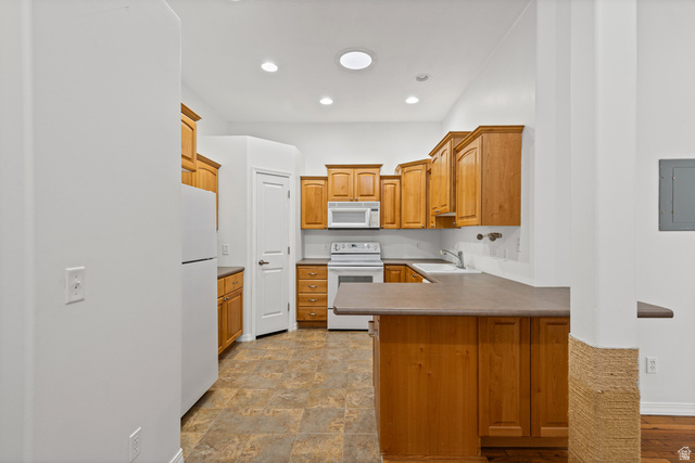 70 North Main Street, Unit 213 Bountiful, UT 84010 - Photo 6 of 15 Kitchen featuring wood cabinetry with all appliances included
