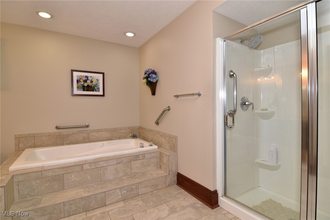 5510 Som Center Road Solon, OH 44139 - Photo 26 of 38 Full bath featuring a shower stall and a bath