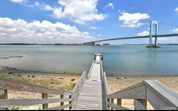 a view of a swimming pool with a terrace