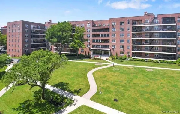 a view of a children in front of the house