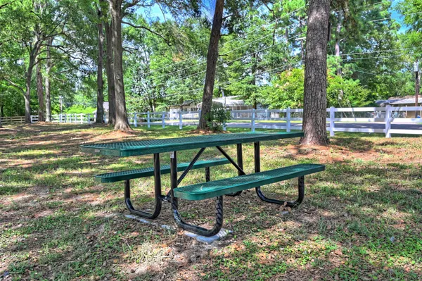 a view of a bench in a garden