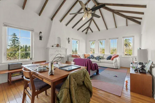 a living room with furniture and a table