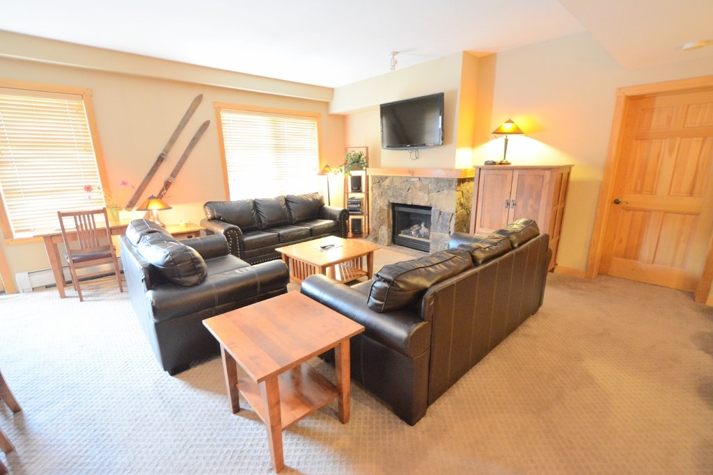 Unit 505 has a huge living area.  Here is the living area with TWO full size sleeper sofas plus loveseat, gas fireplace & wall mounted television (electric, gas, cable TV, wireless internet, hot water & water / sewer are included in Association Fee)