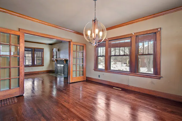 a view of livingroom with hardwood floor and windows