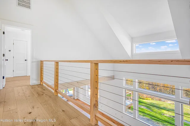 a bathroom with a sink a vanity and a mirror