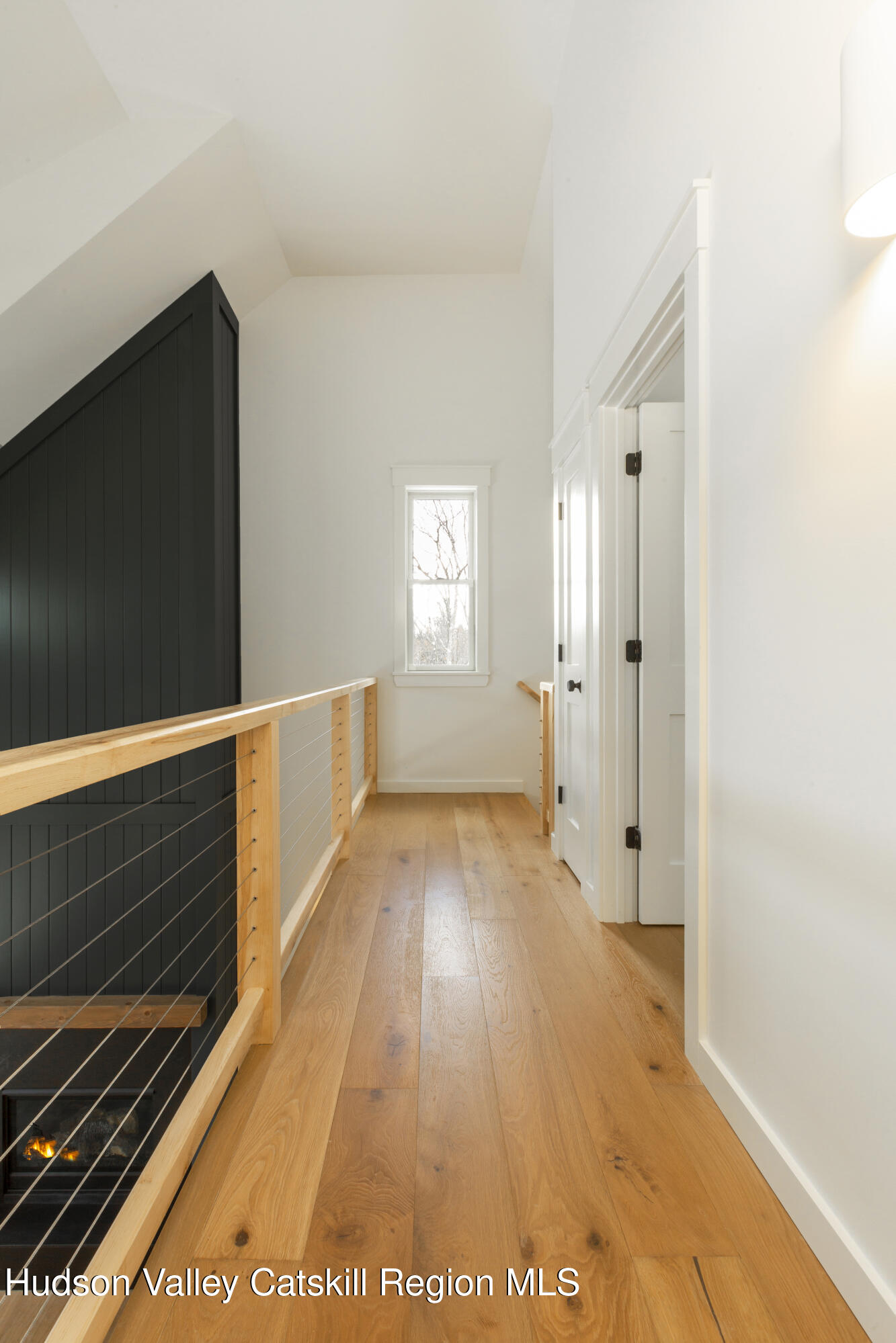 368 Marl Road Pine Bush, NY 12566 - Photo 16 of 29 a view of an empty room with wooden floor and a window
