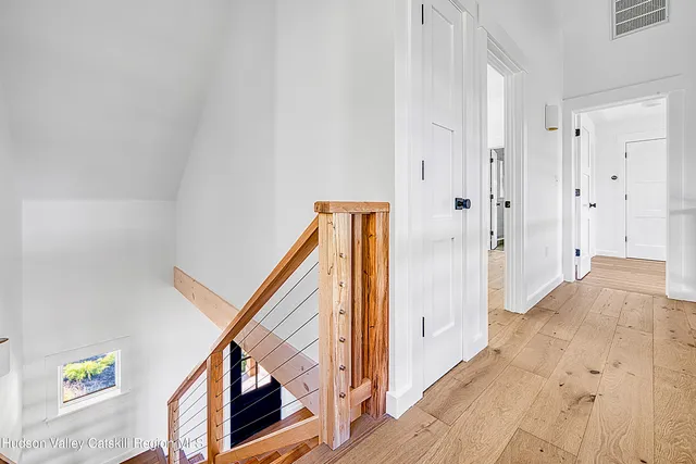 a bathroom with a double vanity sink mirror and