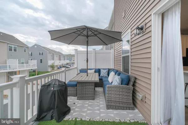 a balcony with furniture