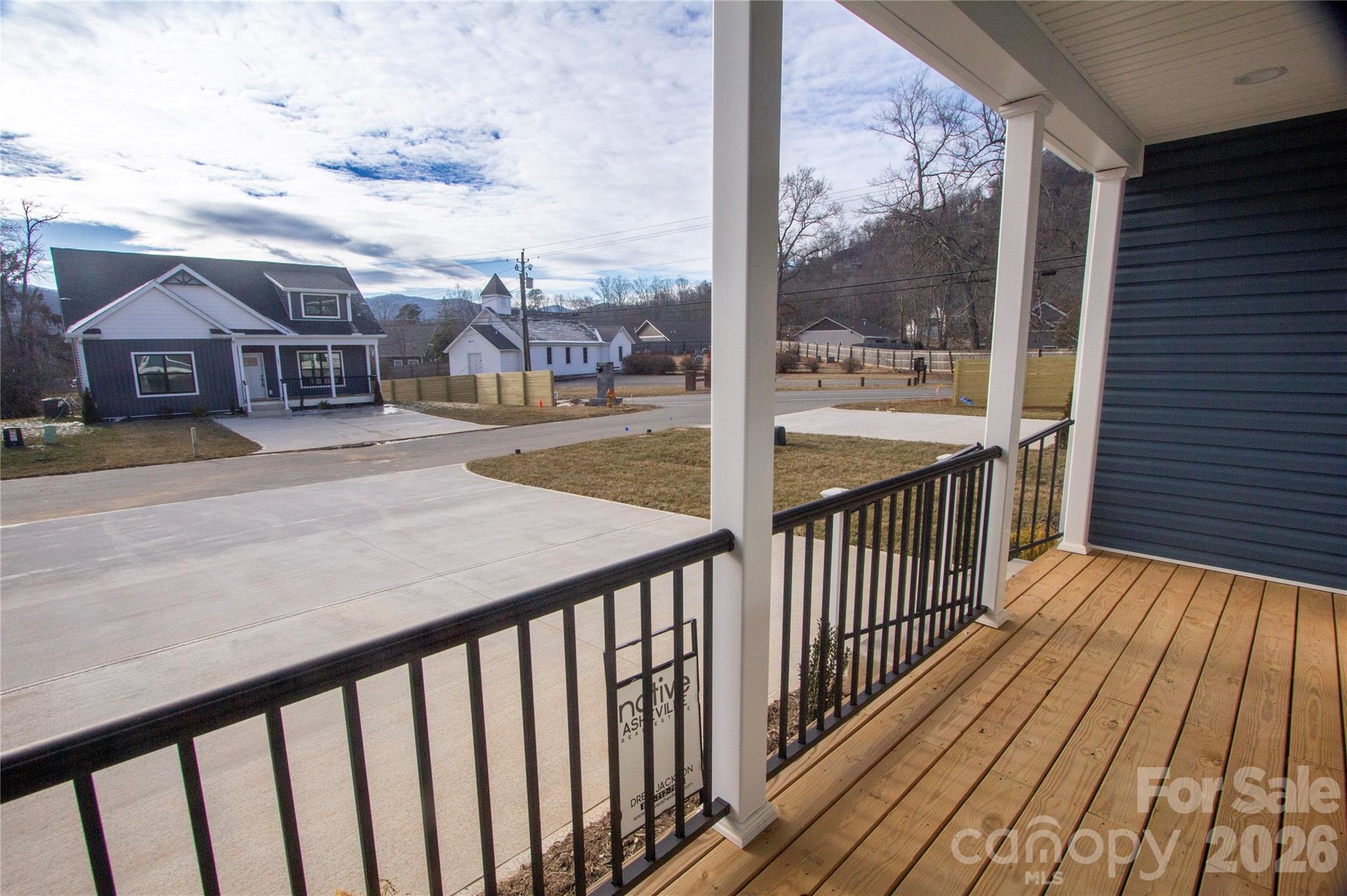 203 Southern Charm Road Arden, NC 28704 - Photo 31 of 34 a balcony with wooden floor