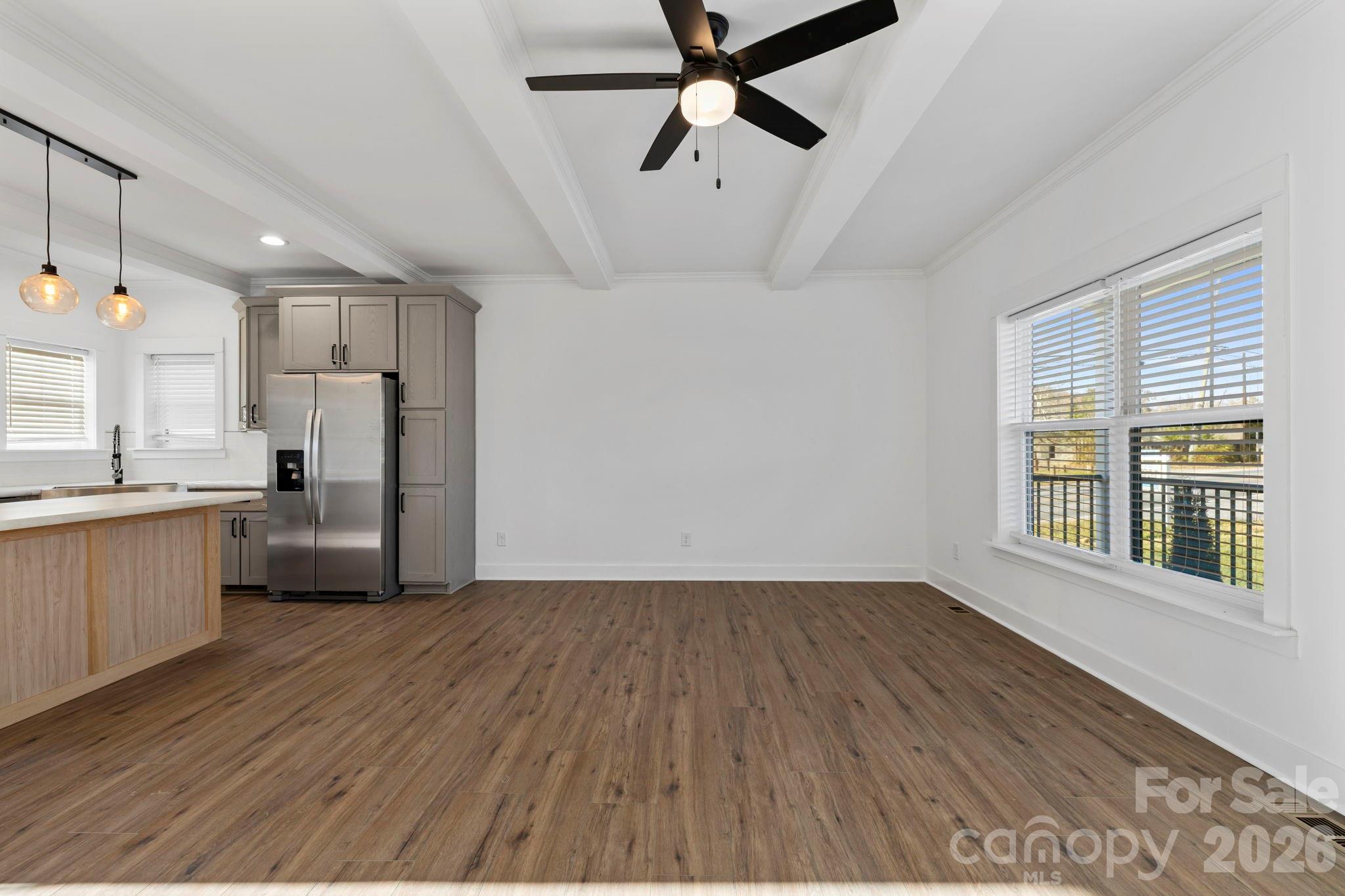 203 Southern Charm Road Arden, NC 28704 - Photo 5 of 34 a view of a kitchen with a sink cabinets and wooden floor