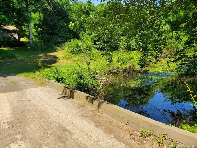 a view of a garden with a bench
