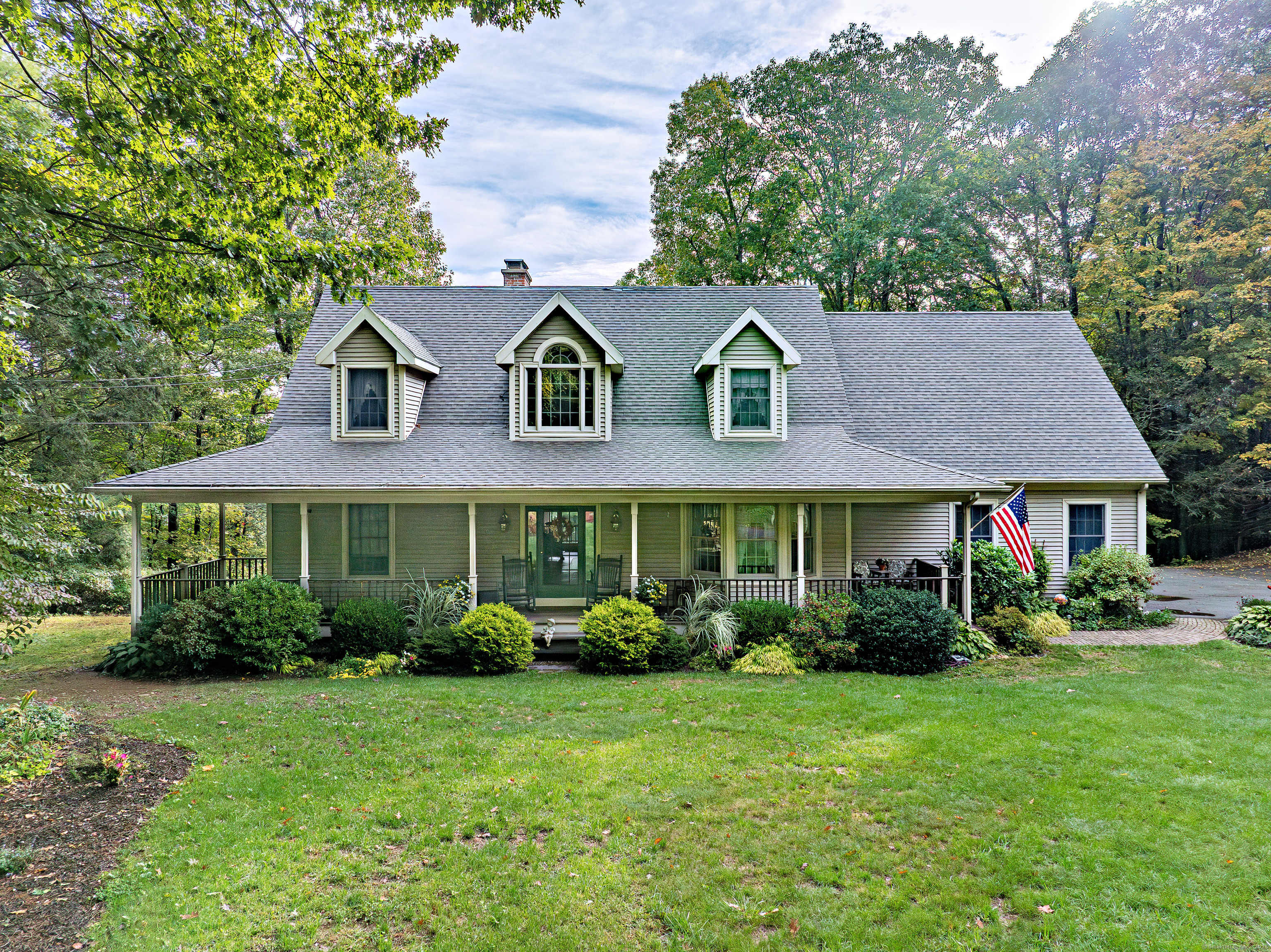 front view of a house with a yard
