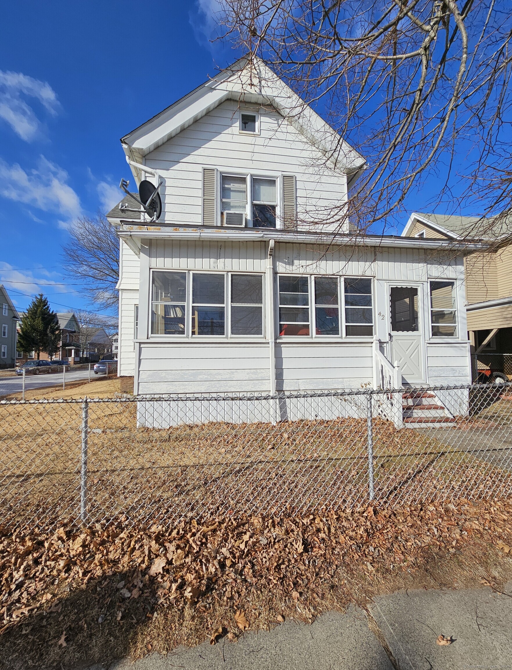 42 Washington Street Wallingford, CT 06492 - Photo 1 of 15 front view of a house with a yard