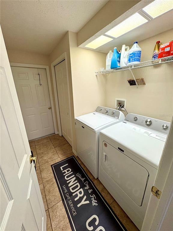 7964 Roundelay Drive New Port Richey, FL 34654 - Photo 20 of 27 a room with storage and utility