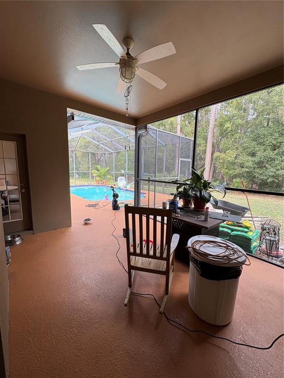 7964 Roundelay Drive New Port Richey, FL 34654 - Photo 21 of 27 a view of a dining room with furniture window and outside view