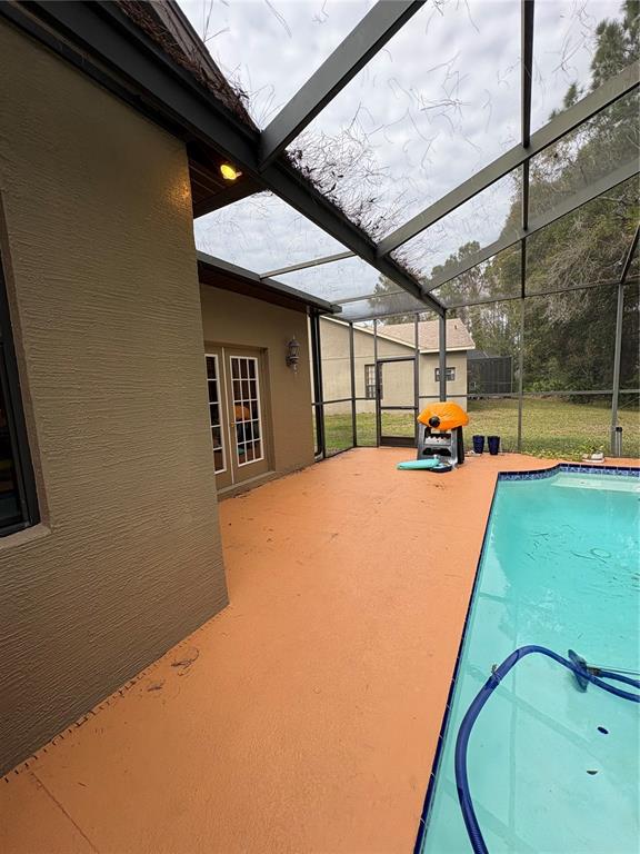 7964 Roundelay Drive New Port Richey, FL 34654 - Photo 25 of 27 a view of swimming pool with a patio