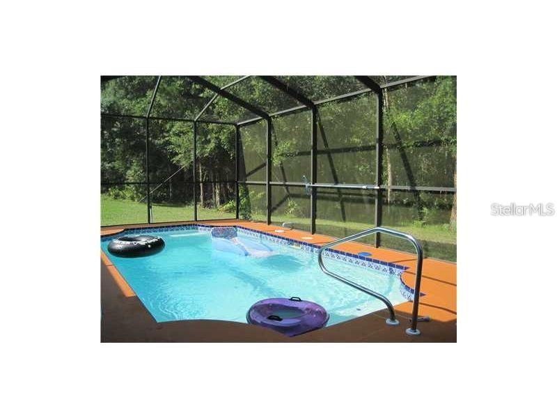 7964 Roundelay Drive New Port Richey, FL 34654 - Photo 26 of 27 a view of a tennis ground