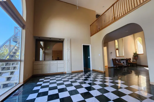 a view of walk in closet with wooden floor