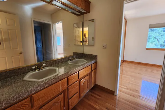 a living room with furniture fireplace and flat screen tv