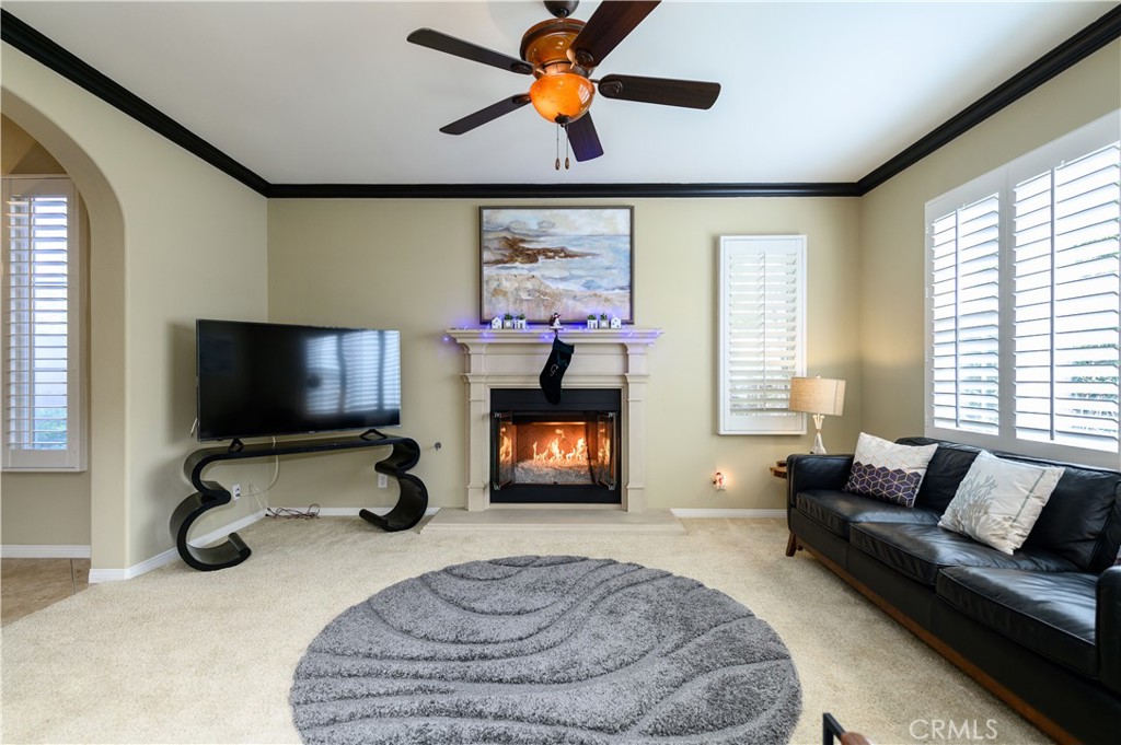 6 Inglenook Irvine, CA 92602 - Photo 8 of 59 a living room with furniture and a flat screen tv