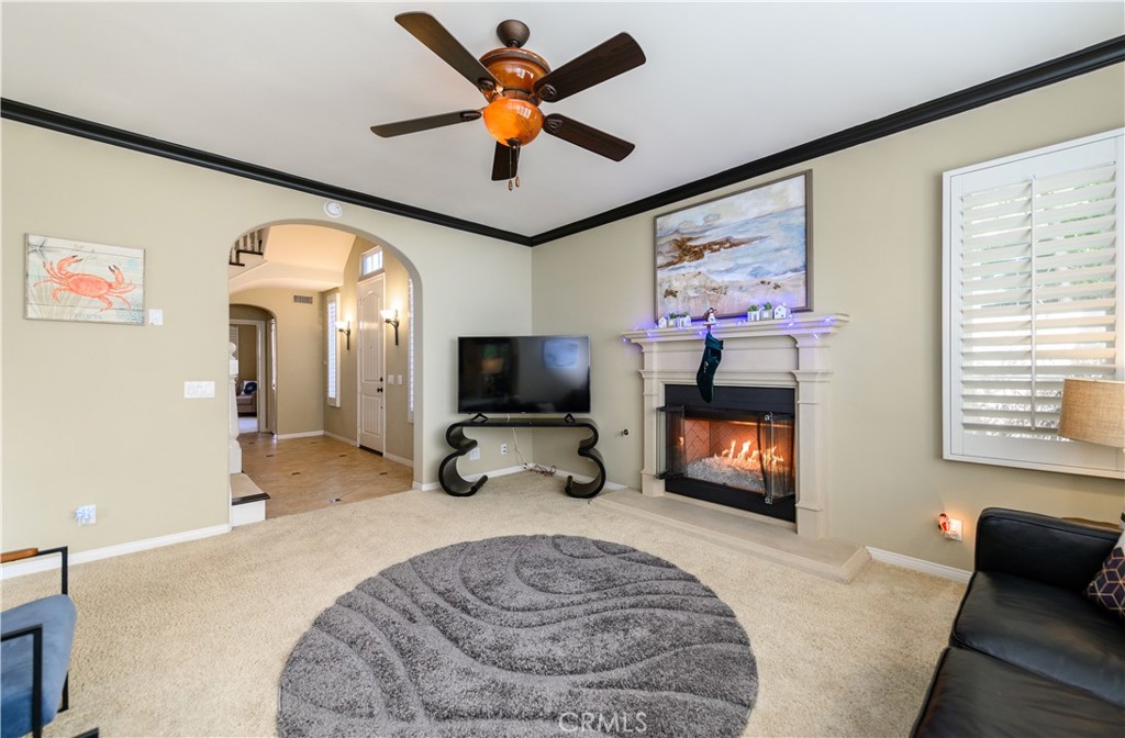 6 Inglenook Irvine, CA 92602 - Photo 10 of 59 a bedroom with furniture and a flat screen tv