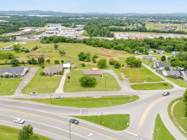 a view of a swimming pool and an outdoor space