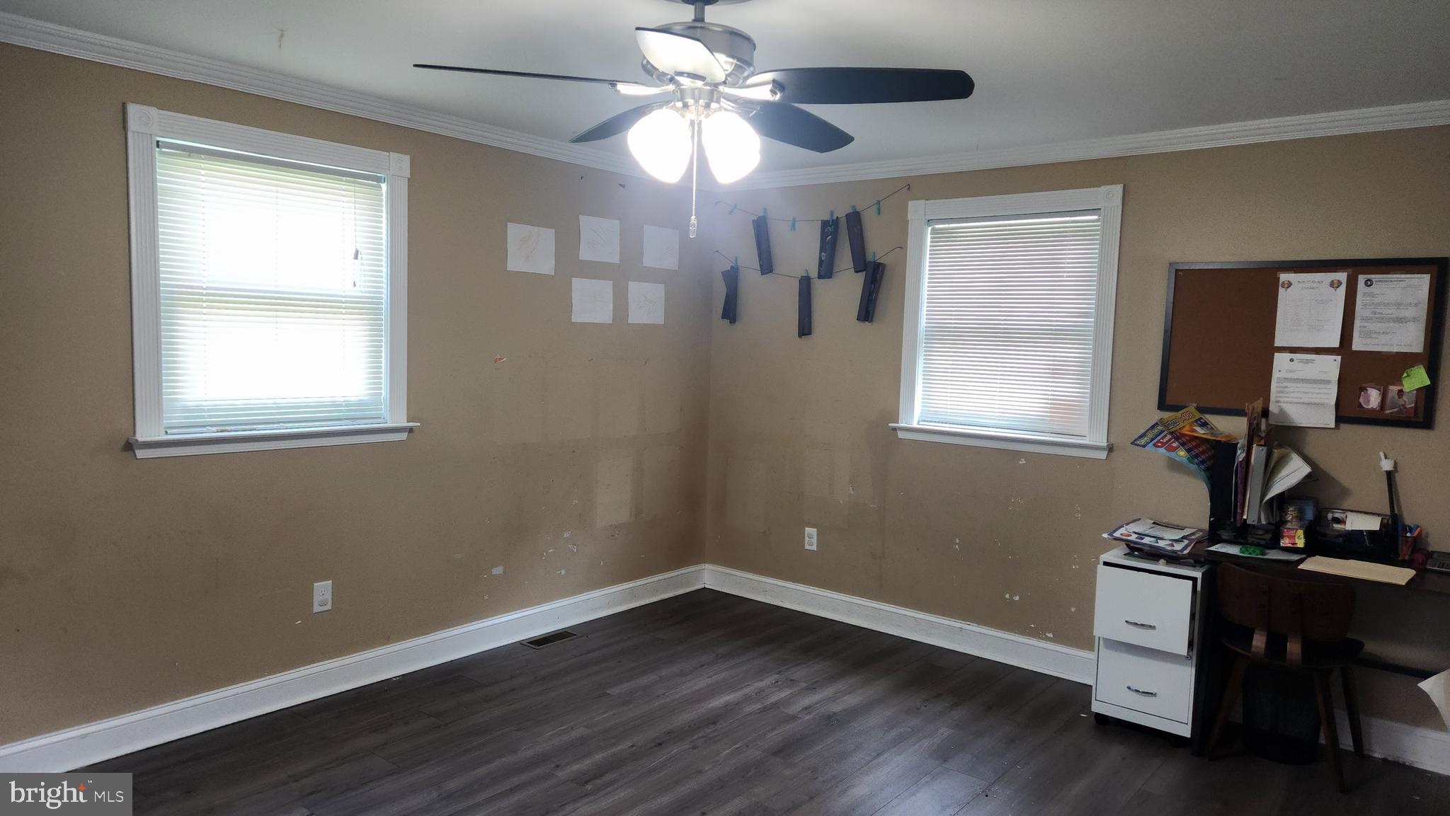 18601 Johnson Road Lincoln, DE 19960 - Photo 7 of 8 a view of a workspace with furniture and a window
