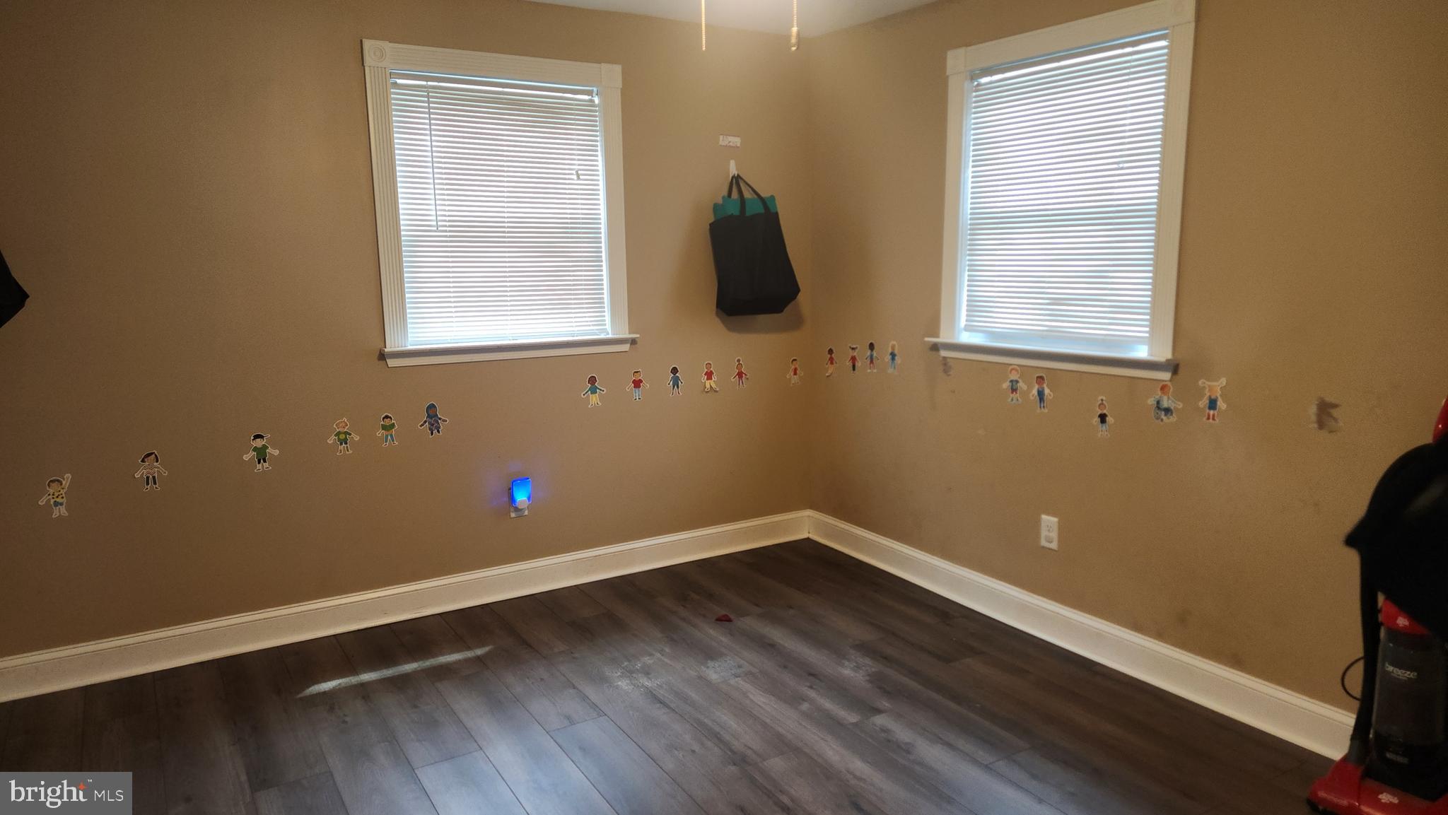 18601 Johnson Road Lincoln, DE 19960 - Photo 10 of 15 a room with window and wooden floor