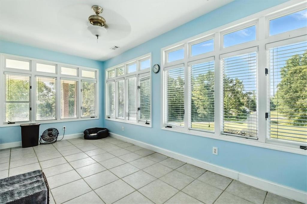 231 Gordon Road Cedartown, GA 30125 - Photo 24 of 49 a spacious bedroom with a bed and a large window