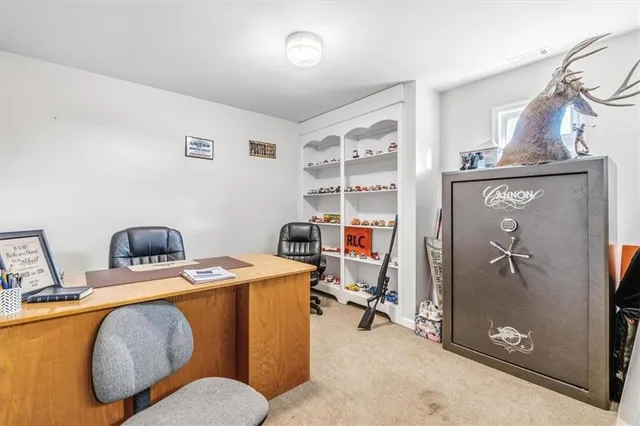 a room with furniture a washer and dryer