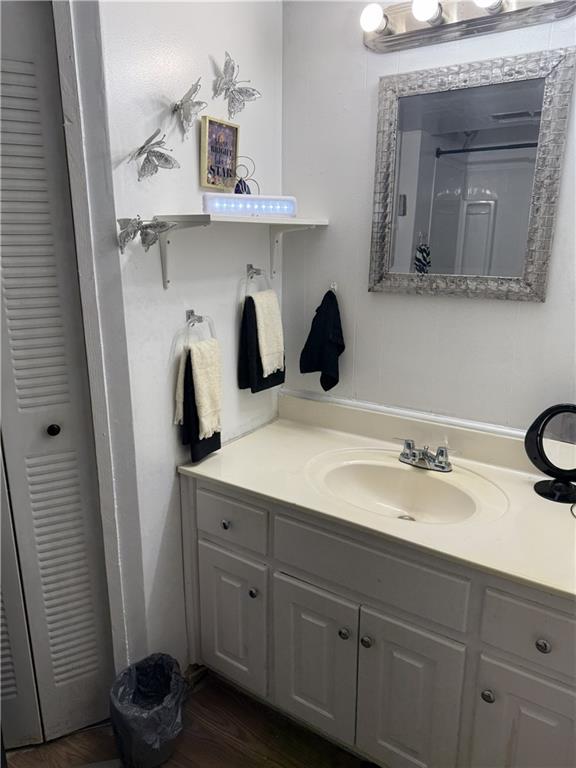 975 Ridgedale Drive Lawrenceville, GA 30043 - Photo 24 of 31 a bathroom with a sink and a mirror