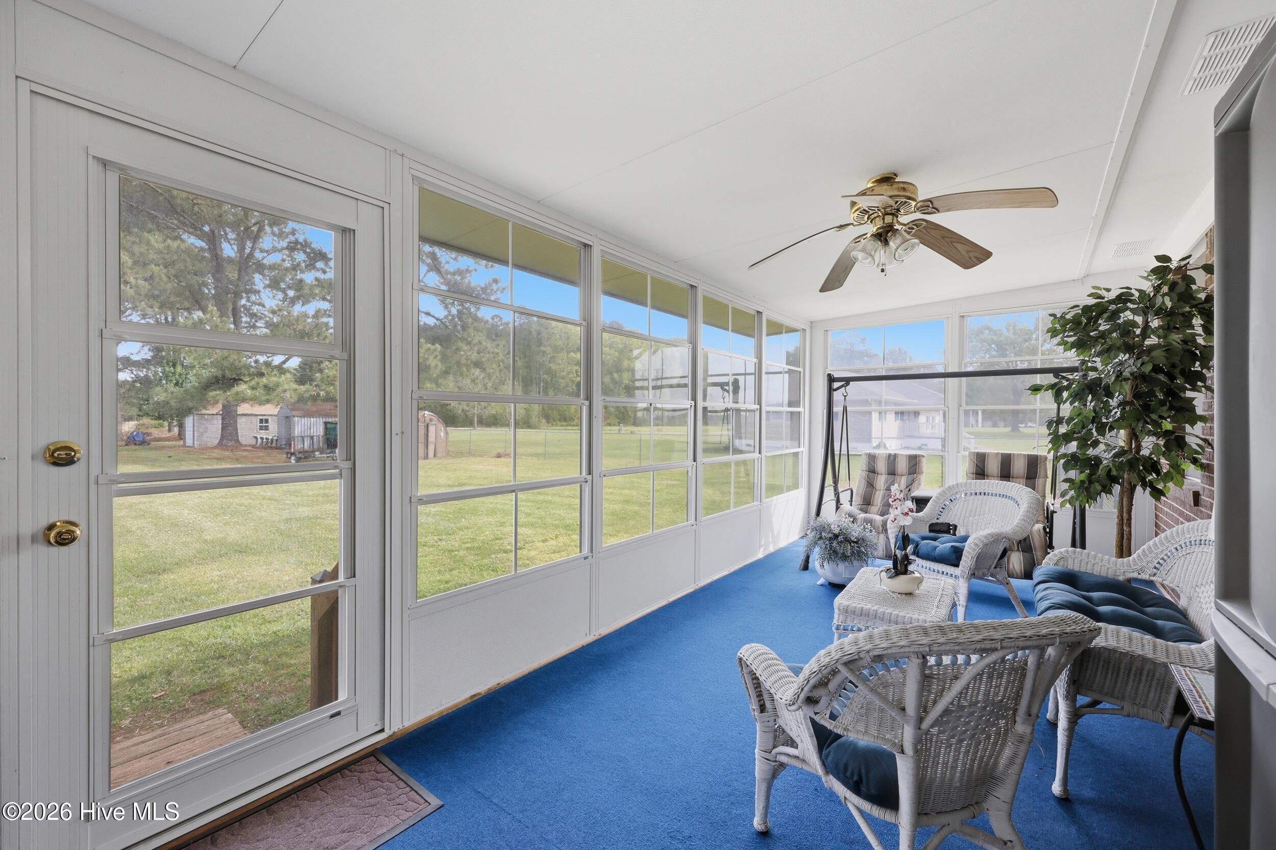 112 Keeter Barn Road South Mills, NC 27976 - Photo 43 of 61 Enclosed porch