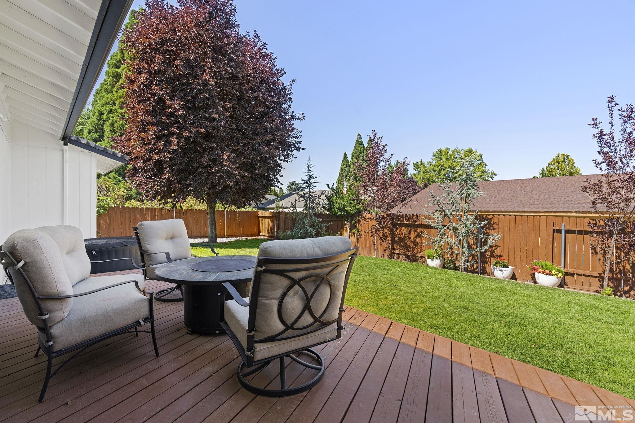 915 Pinebrook Road Reno, NV 89509 - Photo 23 of 29 a backyard of a house with table and chairs