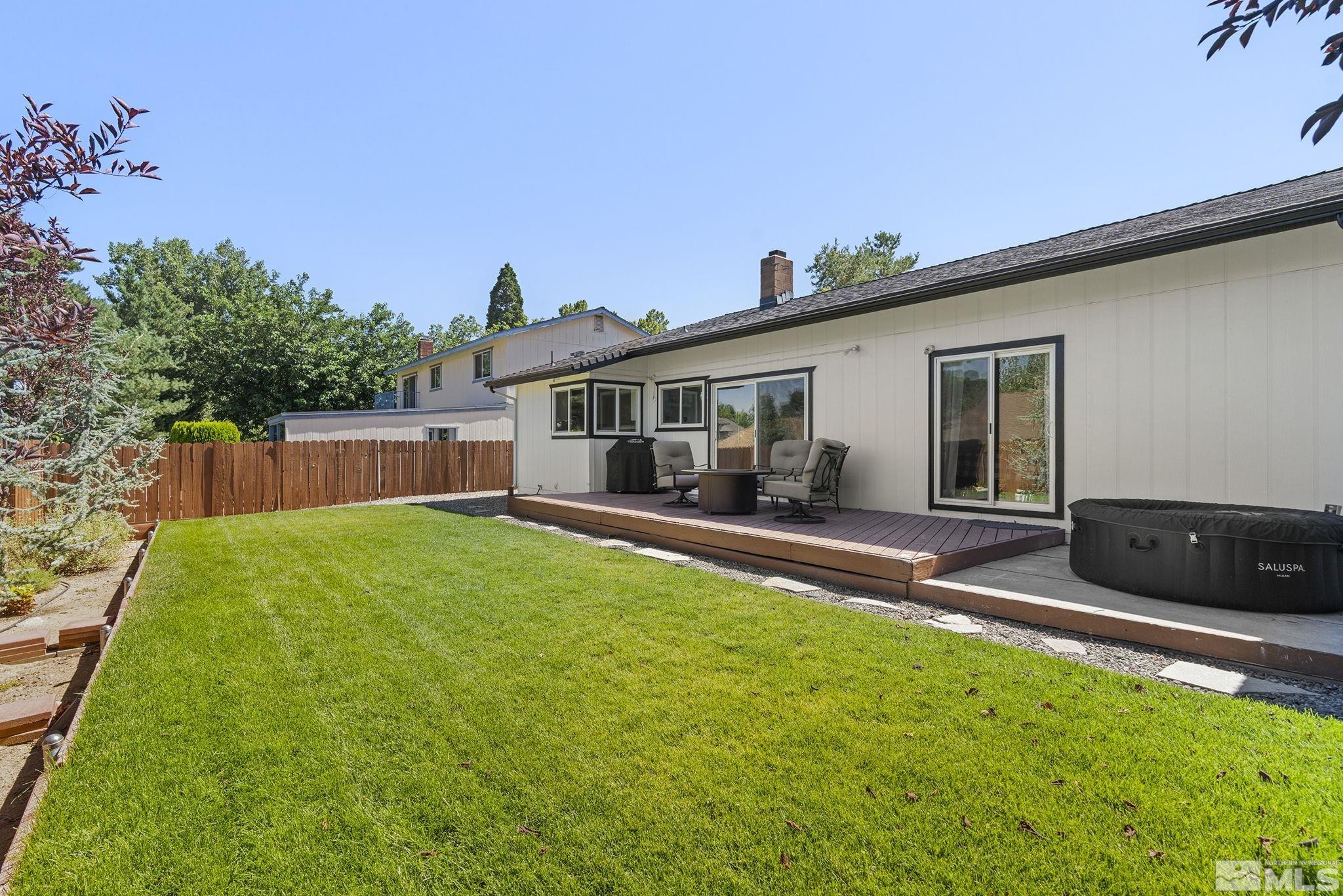 915 Pinebrook Road Reno, NV 89509 - Photo 28 of 29 a view of a house with backyard porch and sitting area