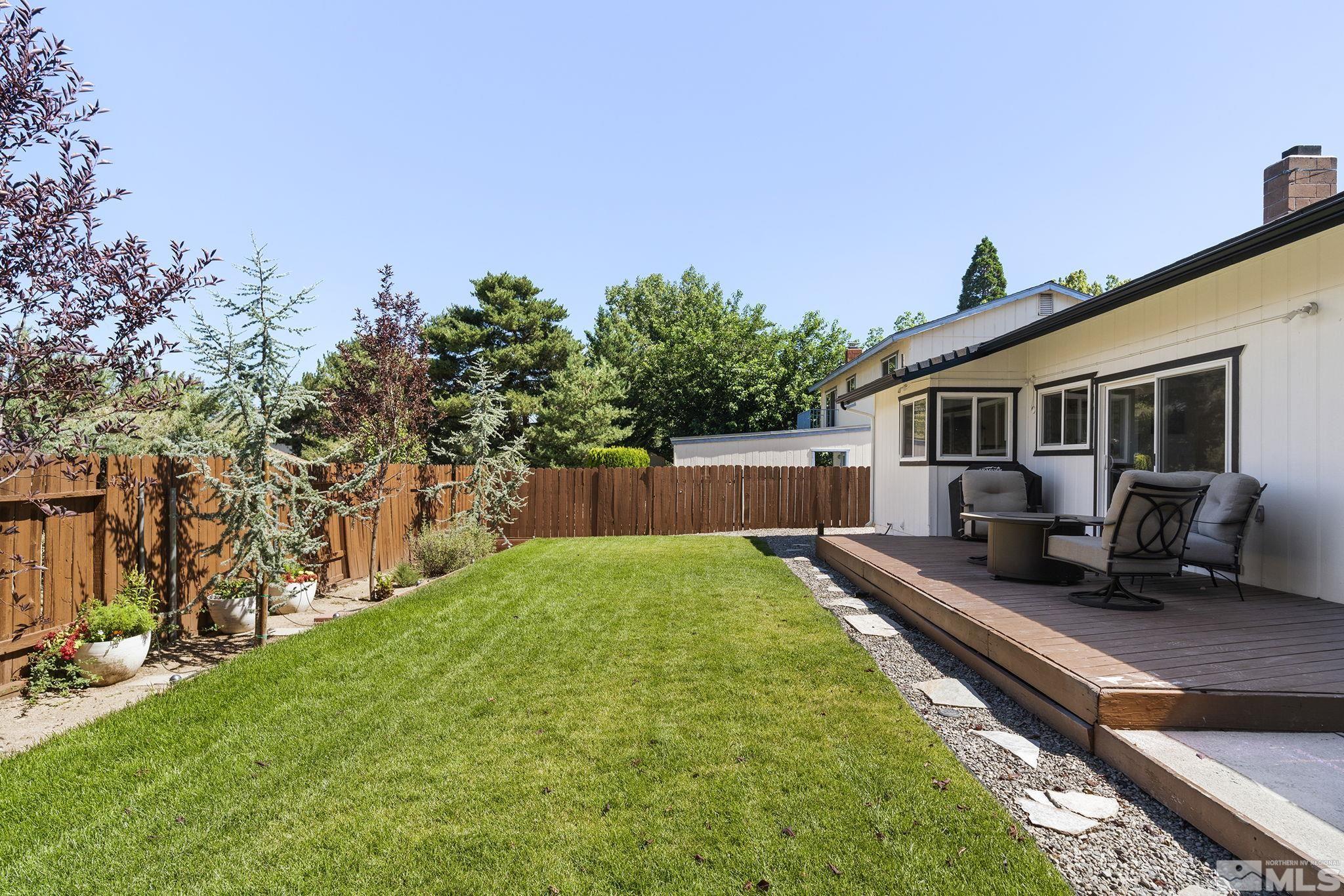 915 Pinebrook Road Reno, NV 89509 - Photo 29 of 29 a view of a backyard with plants and a patio