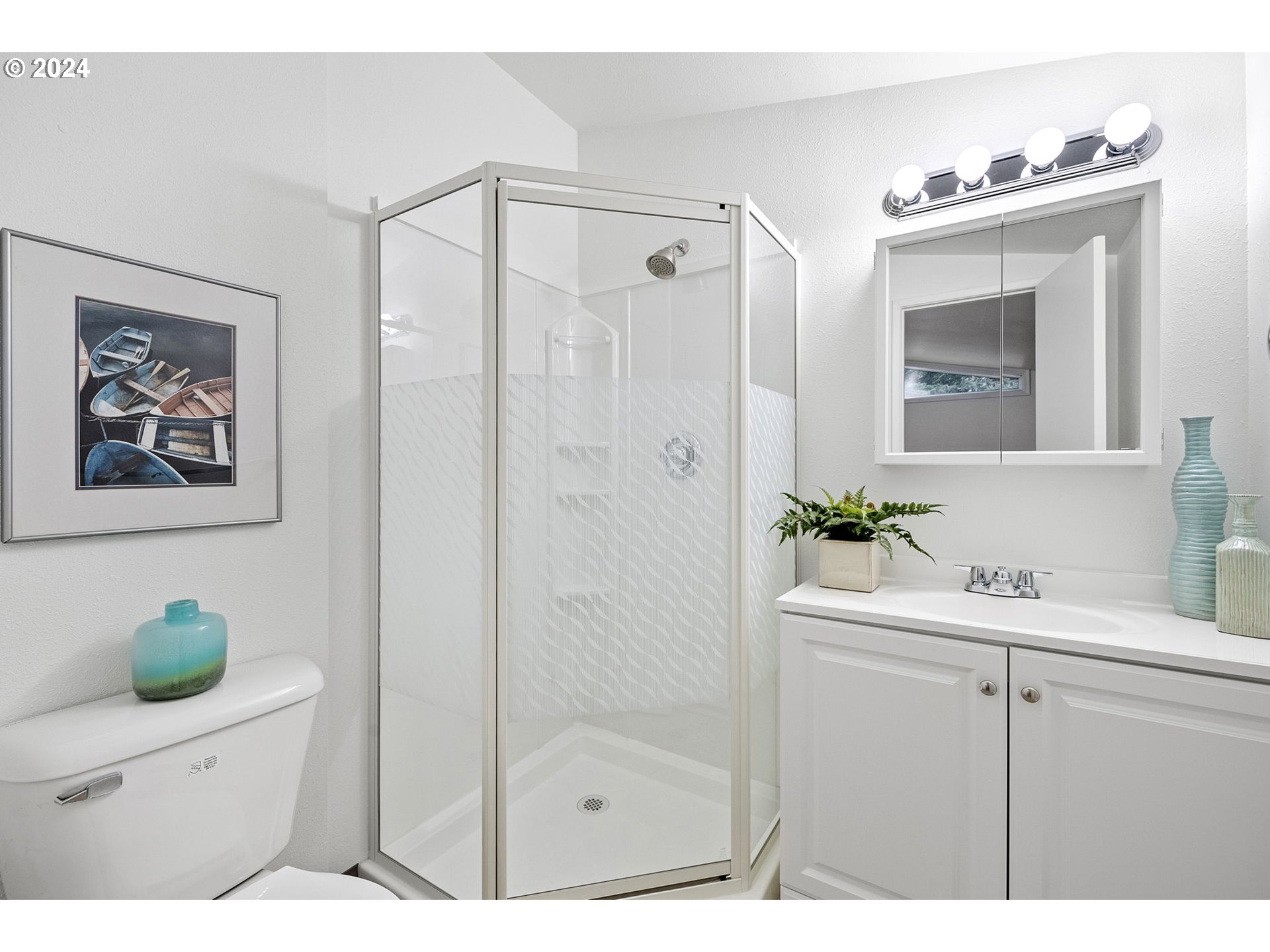 494 Winston Place Springfield, OR 97477 - Photo 36 of 48 a bathroom with a sink a toilet and shower