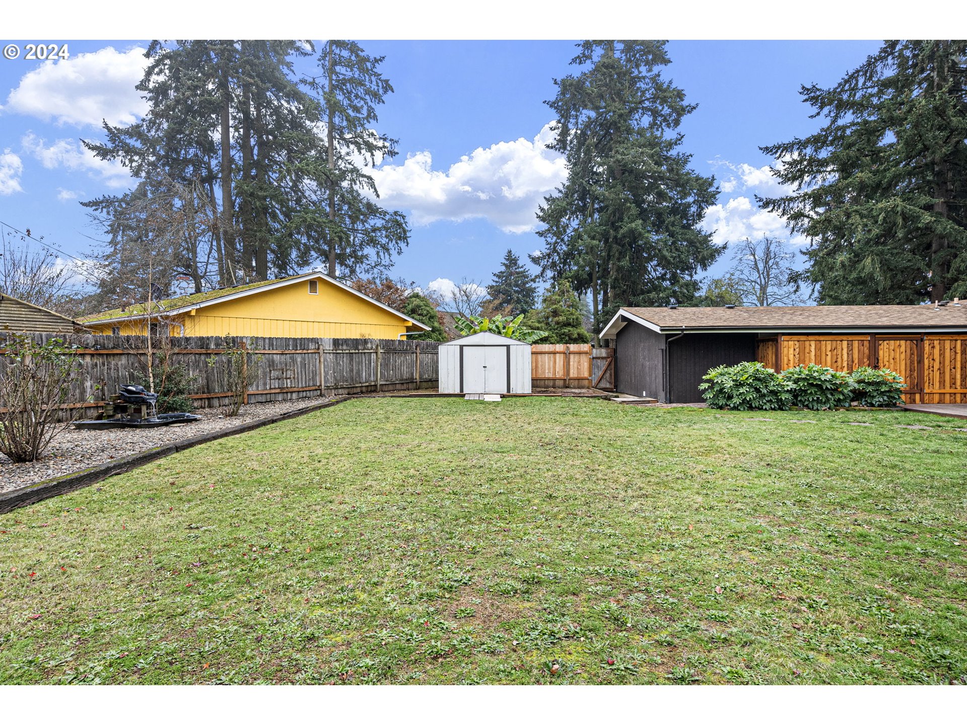 494 Winston Place Springfield, OR 97477 - Photo 38 of 48 a view of a house with a swimming pool