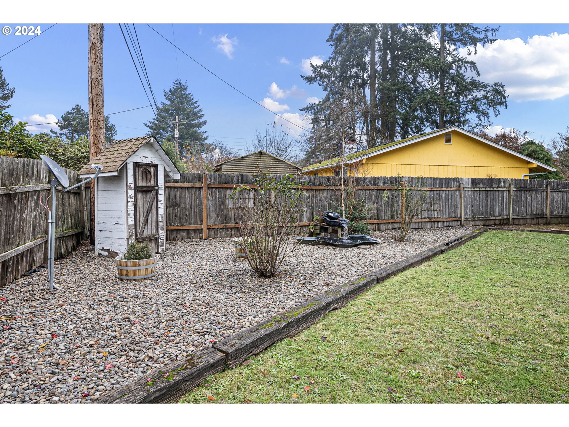 494 Winston Place Springfield, OR 97477 - Photo 46 of 48 a view of a yard with a slide