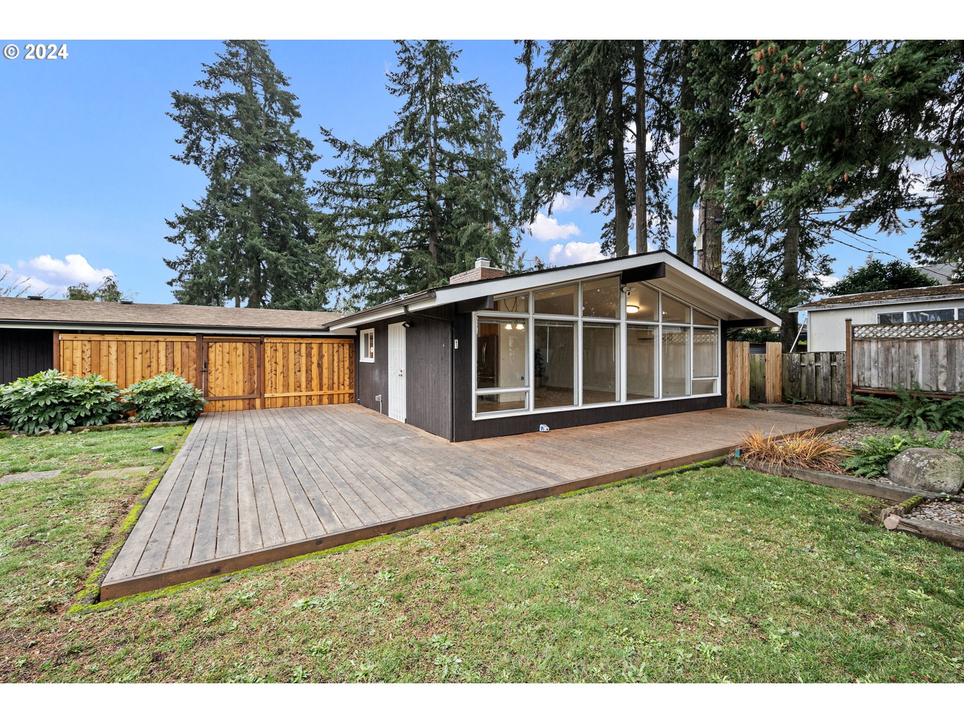 494 Winston Place Springfield, OR 97477 - Photo 9 of 48 a view of a house with a yard