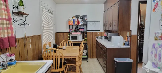 a view of kitchen island with furniture and window