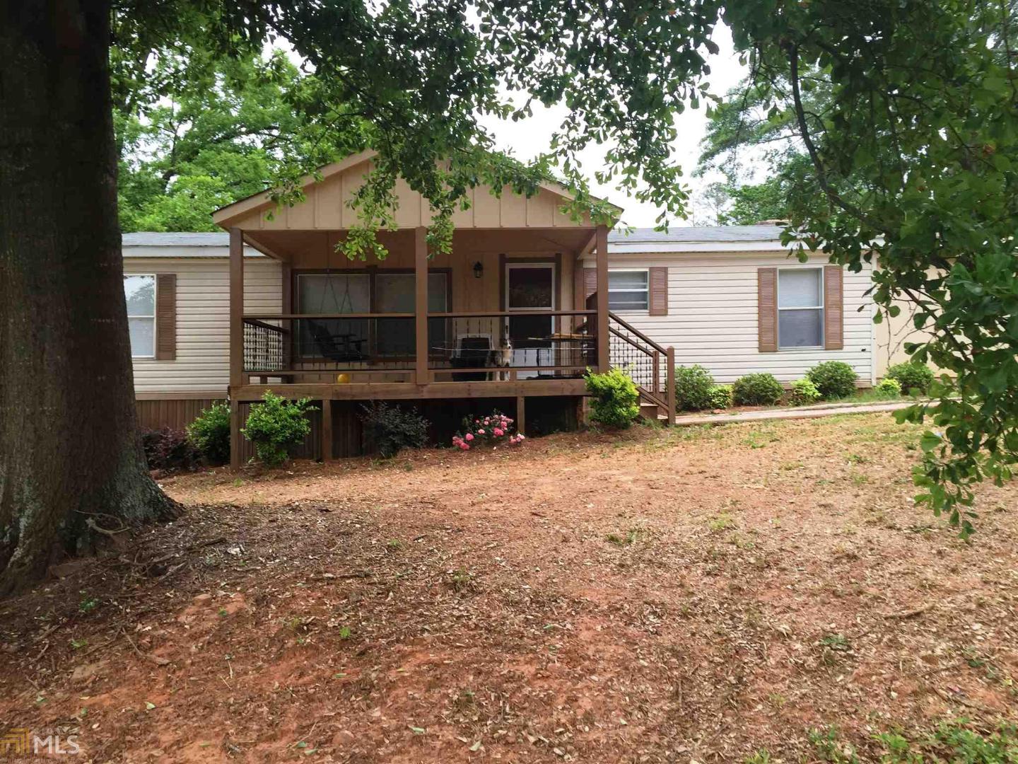 428 Red Hollow Road Martin, GA 30557 - Photo 1 of 1 a front view of a house with a yard