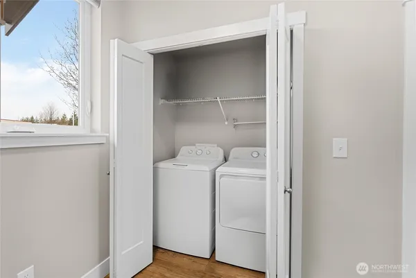a utility room with dryer and washer