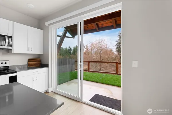 a kitchen with a sink and a window