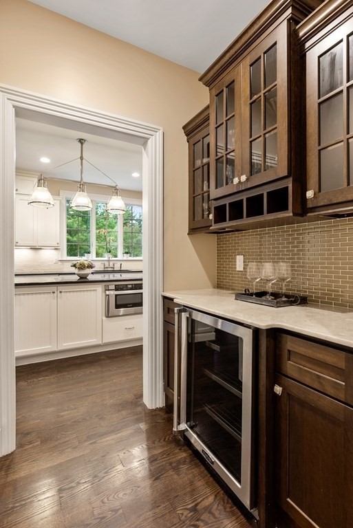 4 Fields Lane Wayland, MA 01778 - Photo 12 of 39 a kitchen with stainless steel appliances granite countertop a stove and a sink