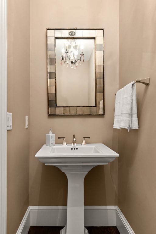 4 Fields Lane Wayland, MA 01778 - Photo 15 of 39 a bathroom with a sink and a mirror
