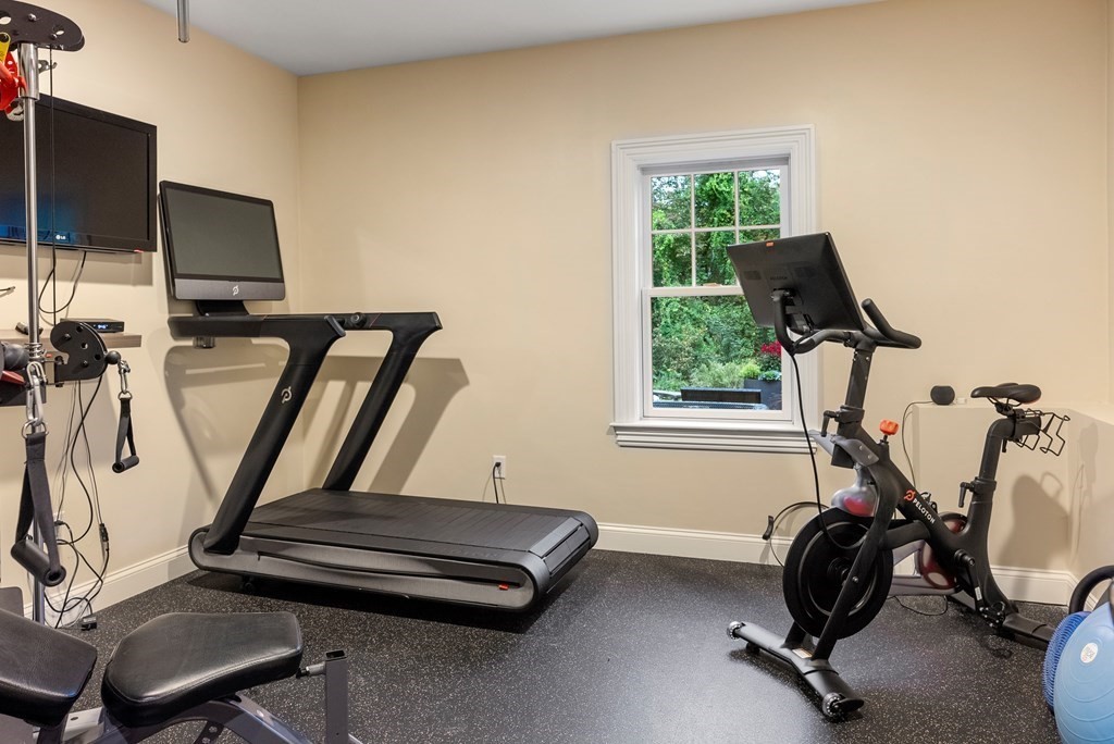 4 Fields Lane Wayland, MA 01778 - Photo 32 of 39 a view of a workspace with gym equipment