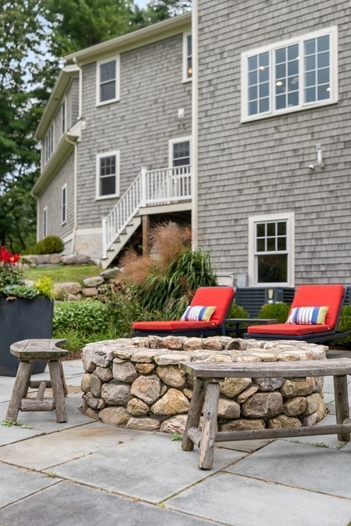 4 Fields Lane Wayland, MA 01778 - Photo 34 of 39 a view of a house with a yard
