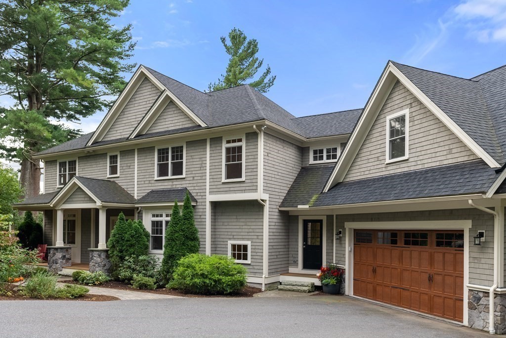 4 Fields Lane Wayland, MA 01778 - Photo 38 of 39 a front view of a house with a yard