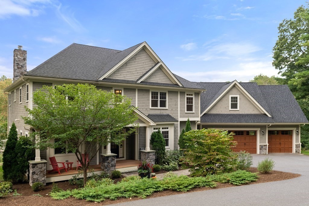 4 Fields Lane Wayland, MA 01778 - Photo 39 of 39 a front view of a house with a yard