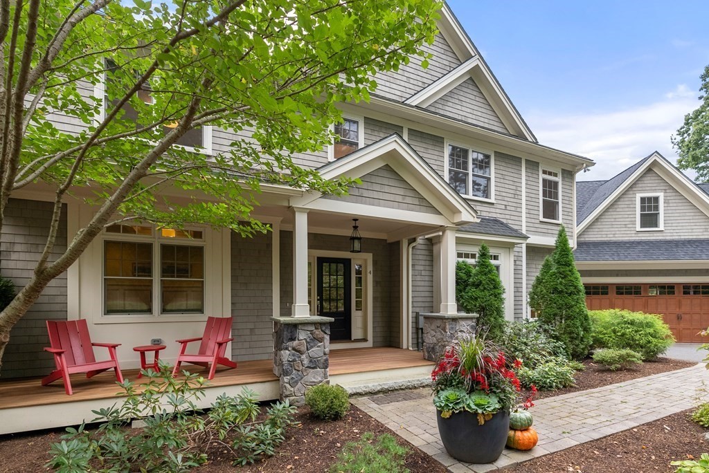 4 Fields Lane Wayland, MA 01778 - Photo 4 of 39 a front view of a house with a porch
